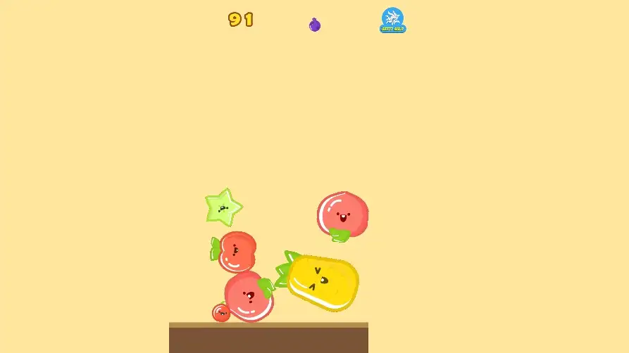 Screenshot from the Watermelon Game showing dynamic fruit-dropping action.